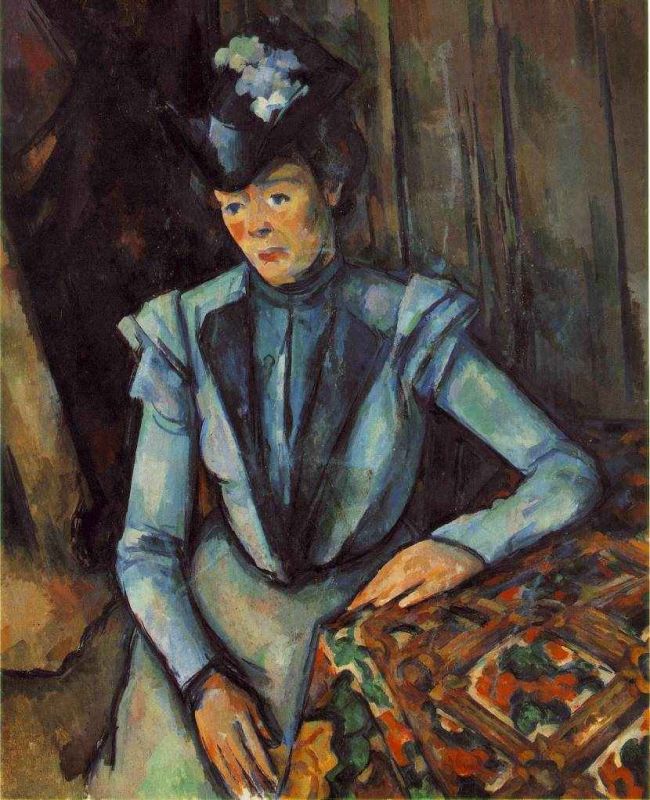 woman seated in blue.jpg